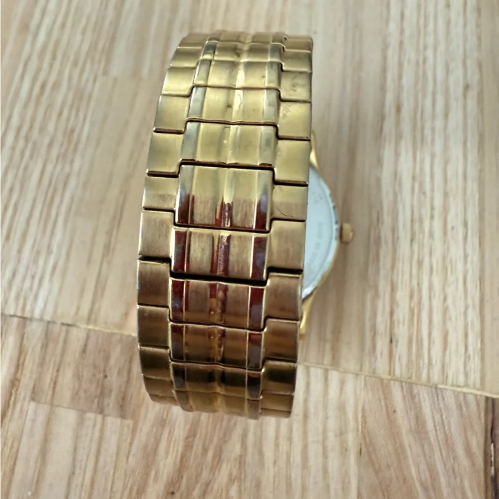 Citizen eco-drive men’s gold tone solar dress watch